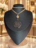 Love Around the World necklace with vintage gold-tone snail-link chain, dimensional rose and upcycled LV travel medallion