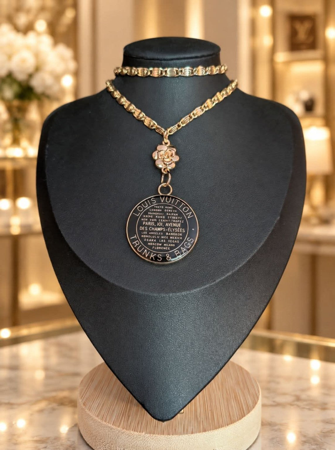 Love Around the World necklace with vintage gold-tone snail-link chain, dimensional rose and upcycled LV travel medallion