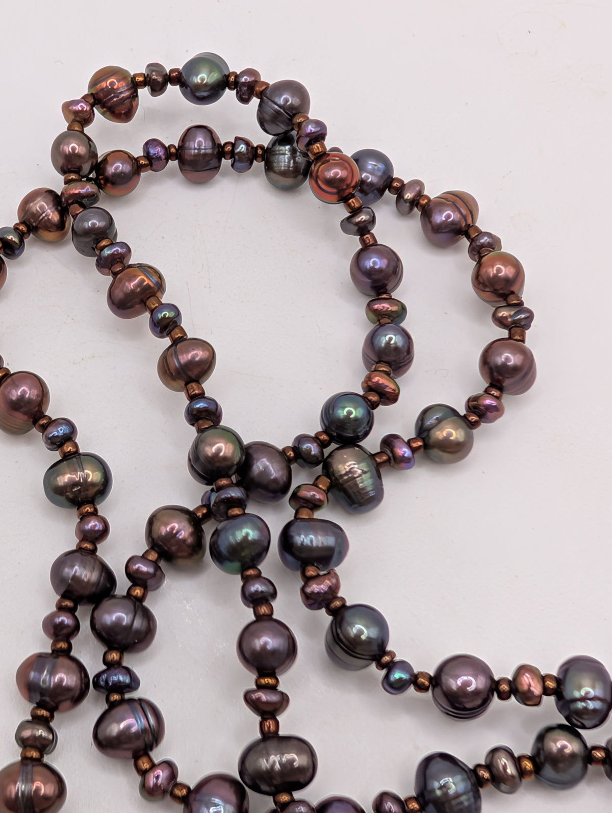 ✨ Peacock Paradise, a gorgeous 22-inch necklace featuring black freshwater pearls ✨